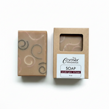Handmade soap bar with a 'The Corner' packaging on a white background