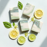 Patterned soap bars with lemon and lime slices on a light background